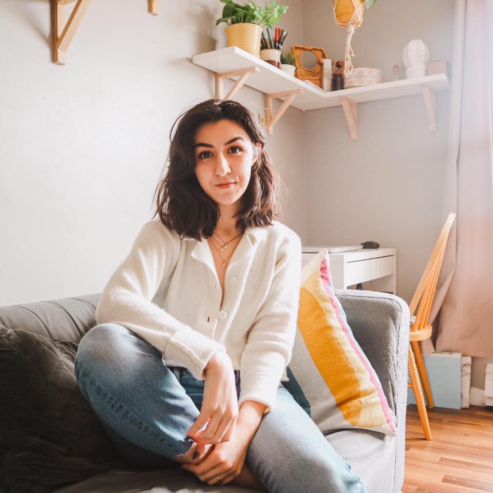 woman sitting on couch