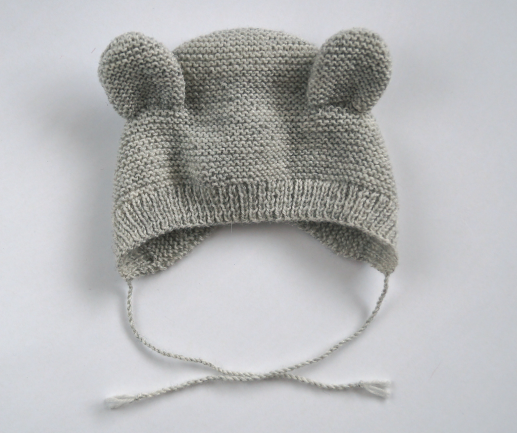 a knit baby bonnet for the winter