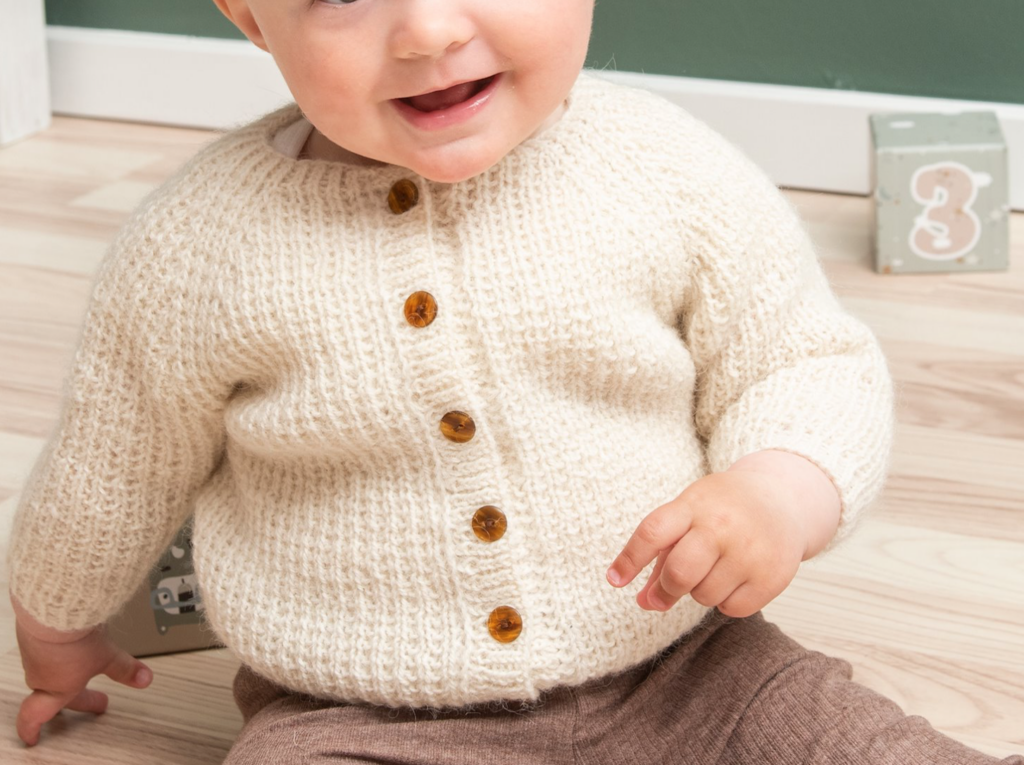 baby in winter knitted cardigan